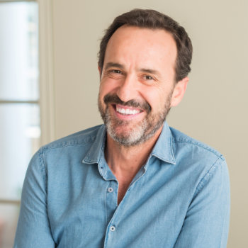 Handsome middle aged man in blue shirt