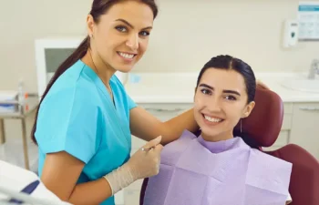 Patient smiling after successful restorative dental treatment