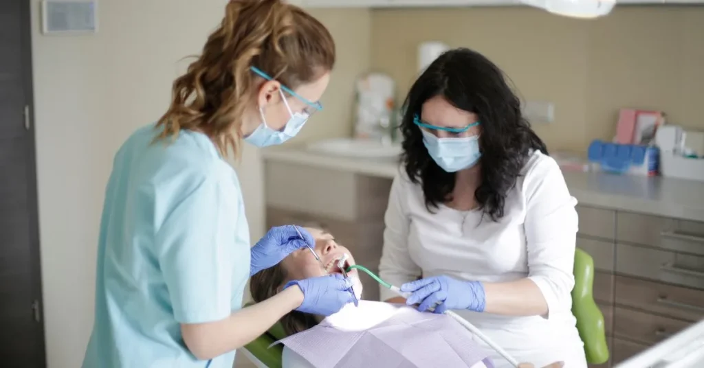 Dentist providing restorative dental treatment to a patient